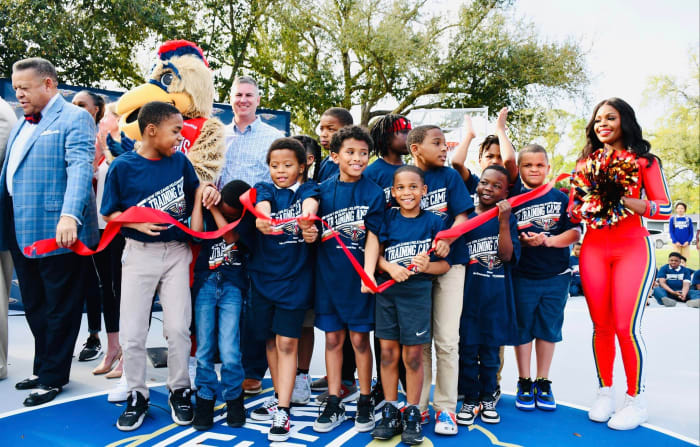 Pelicans unveil the renovated basketball court at the Cheniere Energy Boys & Girls Clubs at Columbus Circle Recreation Center.